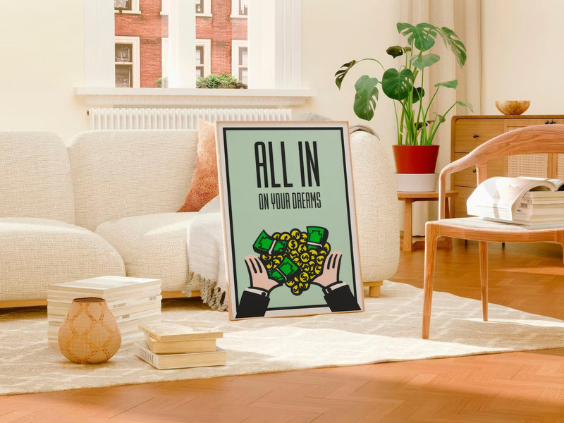 Mint green All In On Your Dreams poster in light wood frame leaning against a boucle sofa