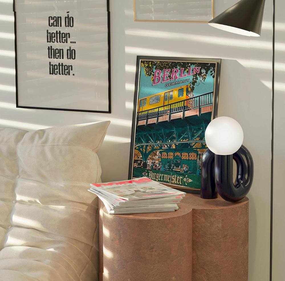 Berlin Burgermeister vintage poster leaning on a textured pedestal in a sunlit contemporary living space