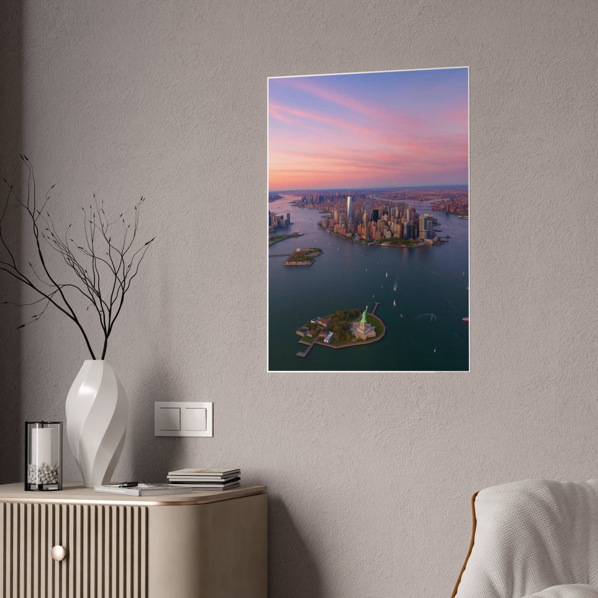 Large New York harbour sunset poster on a living room wall beside a beige sideboard