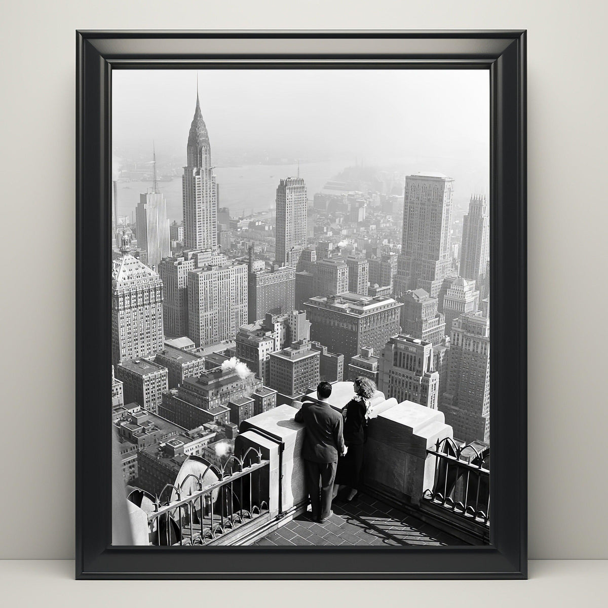 Close view of the framed print showing a couple watching the misty Manhattan skyline